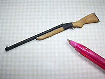 Double barreled shotgun accessory. $20